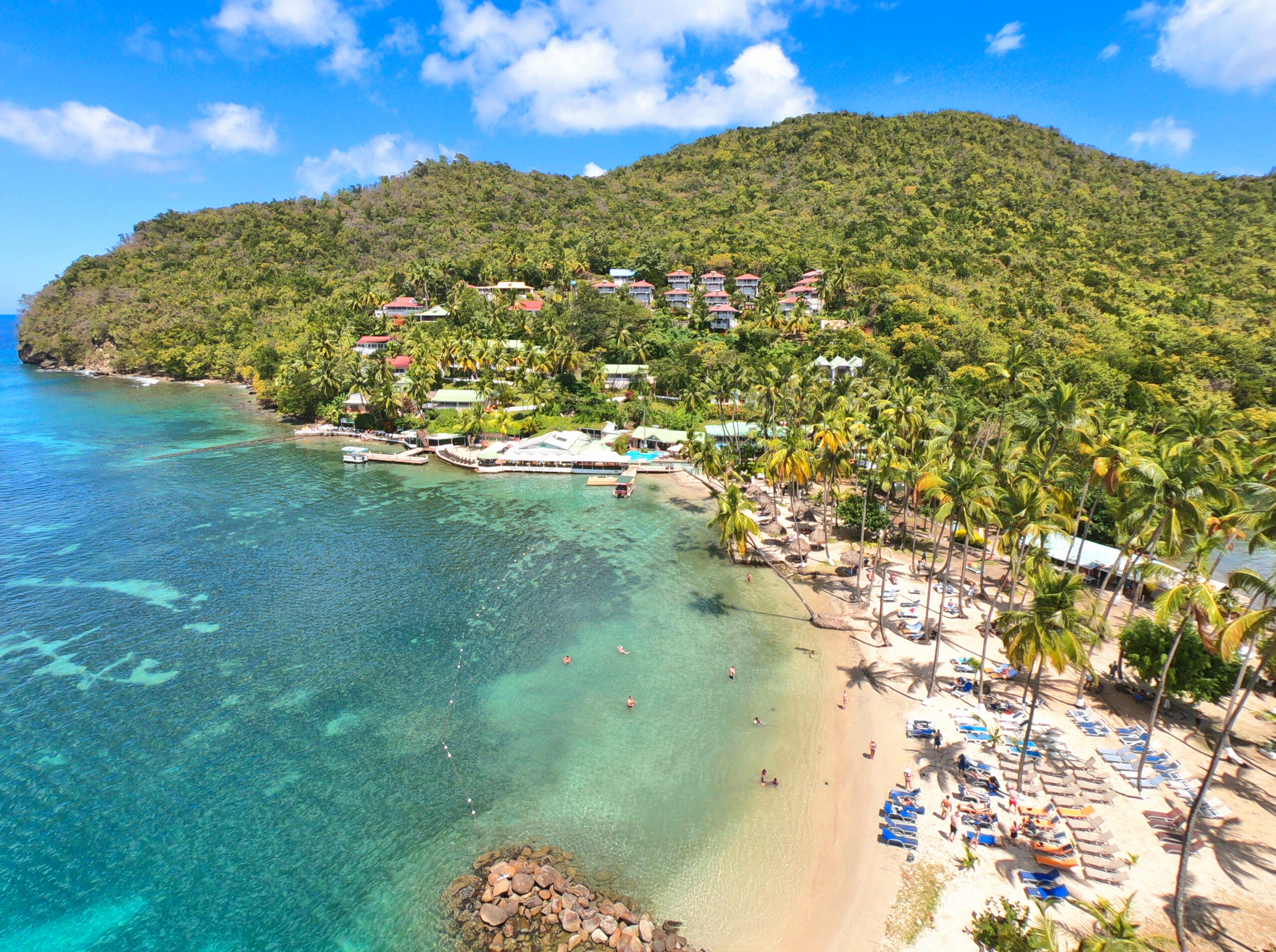 Aerial view of Marigot Beach Club & Dive Resort and the waterfront in Marigot Bay, Saint Lucia